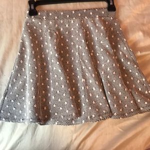 Black and white polka dotted AE skater skirt.
